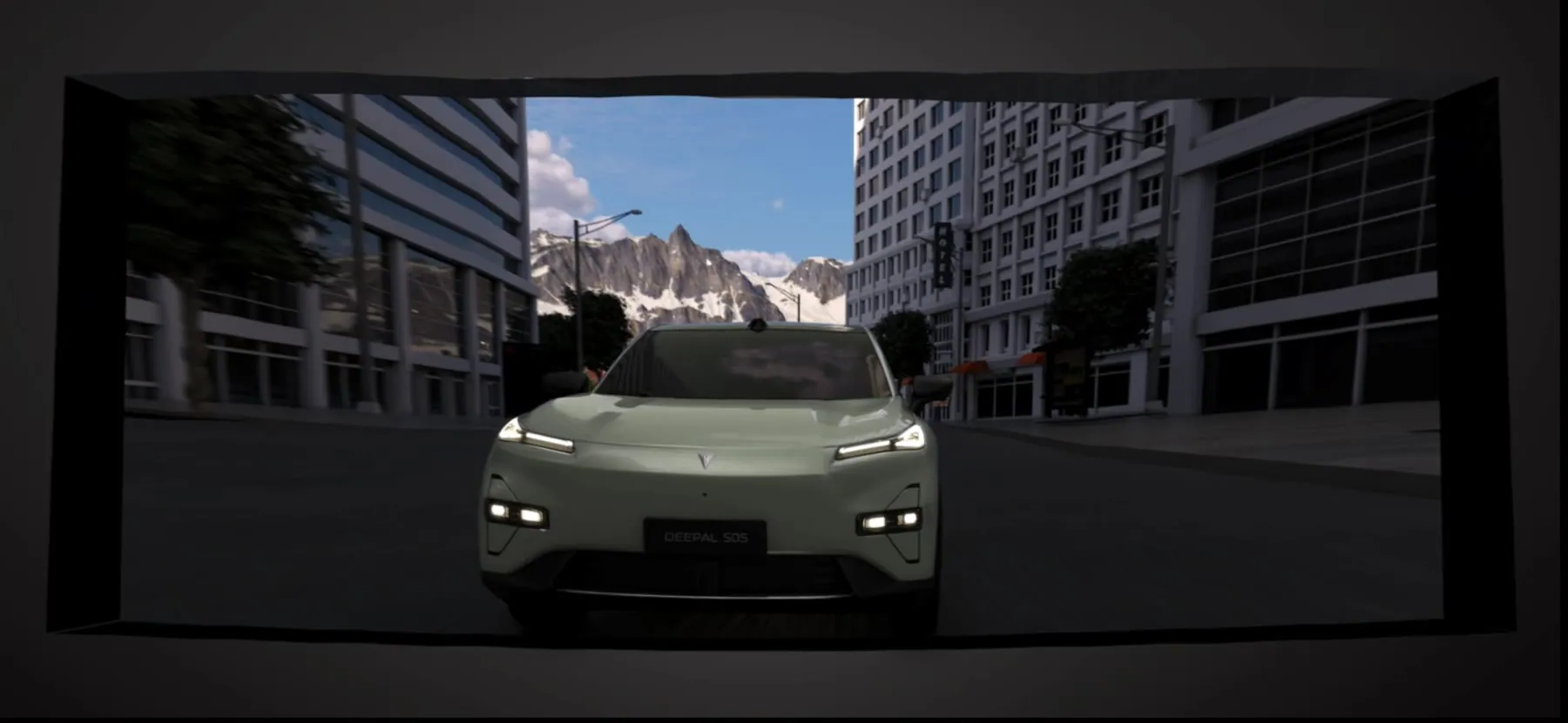 Sage green Deepal S05 facing the camera on a city street between glass buildings, snow peaks behind.